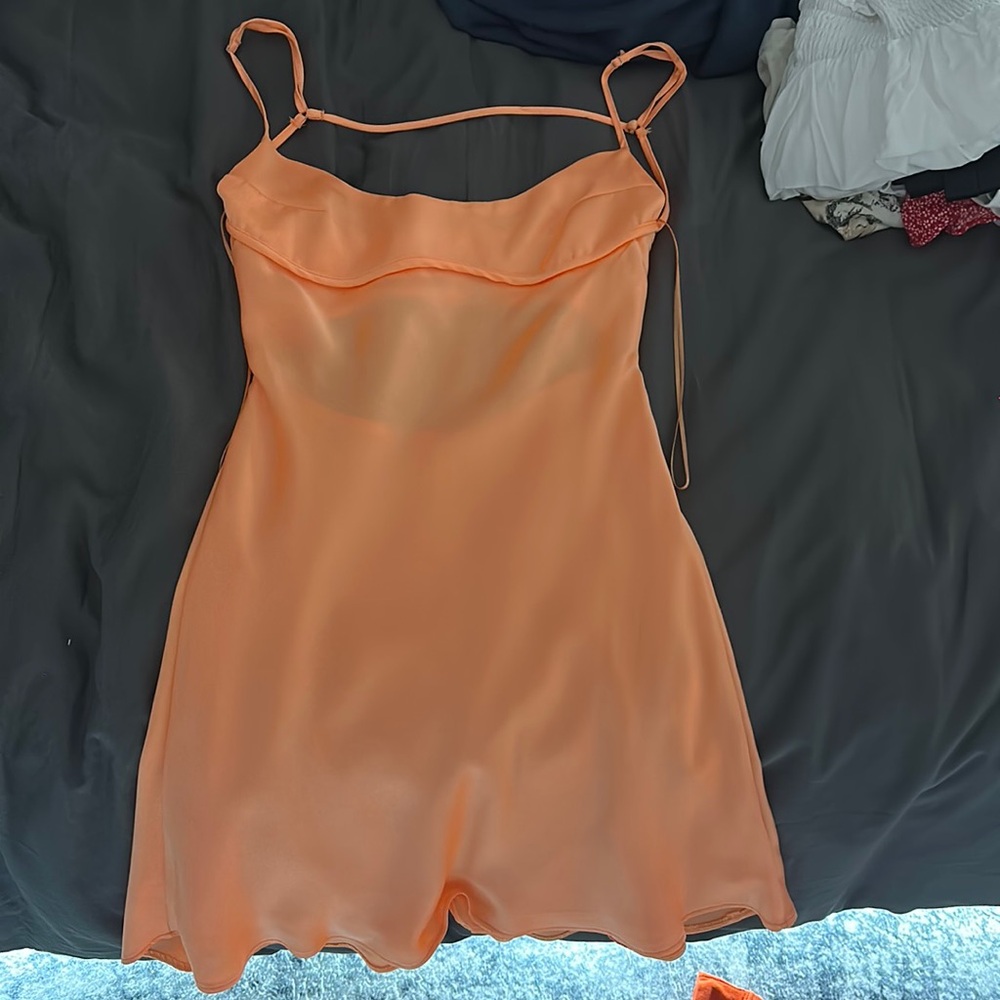 Orange dress. Has never been worn from Zara. Super cute just wasn’t for me!
